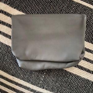 Gray leather clutch